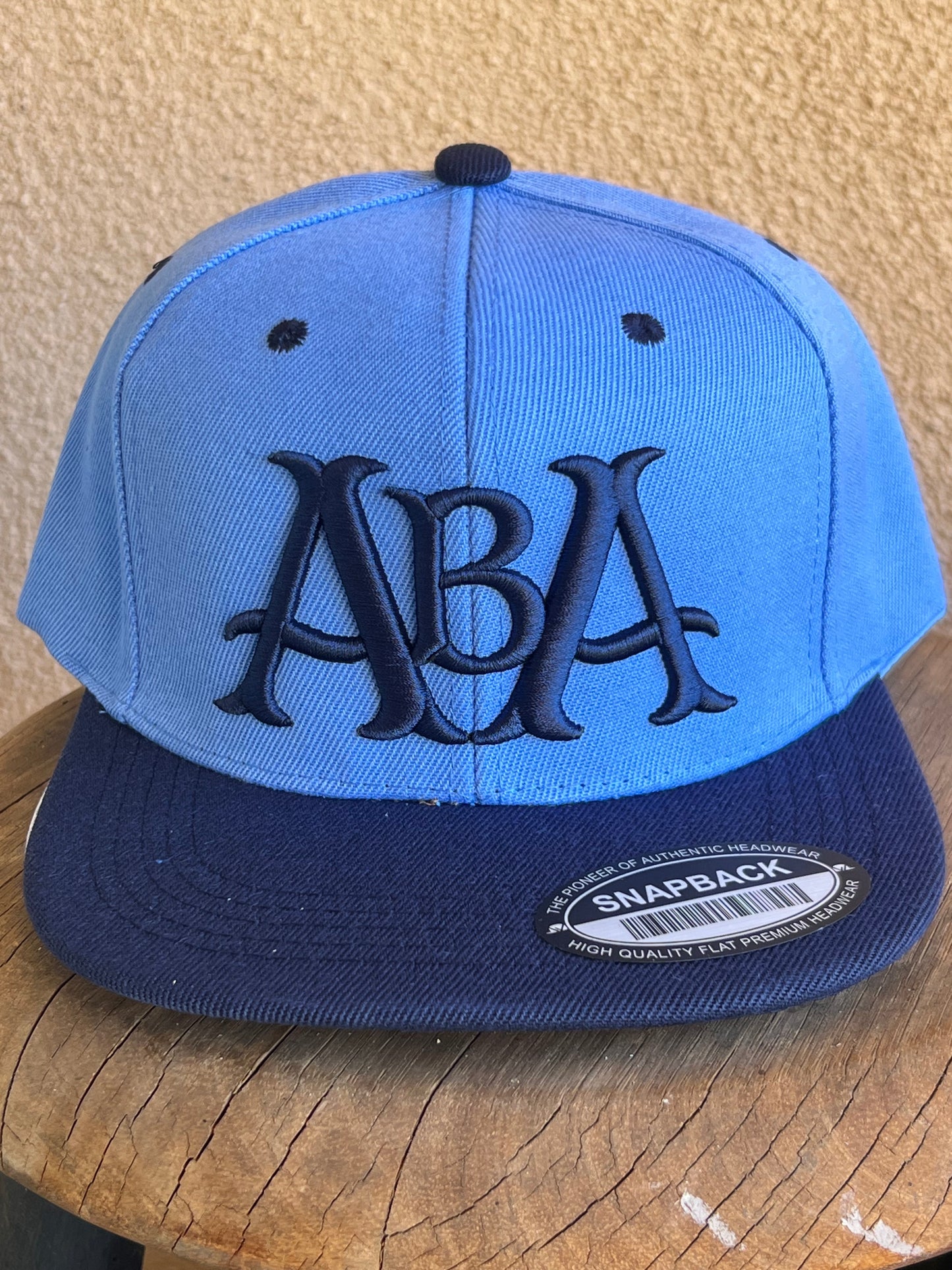 ABA Snapback Hat | Baby Blue (Logo: Navy ABA)